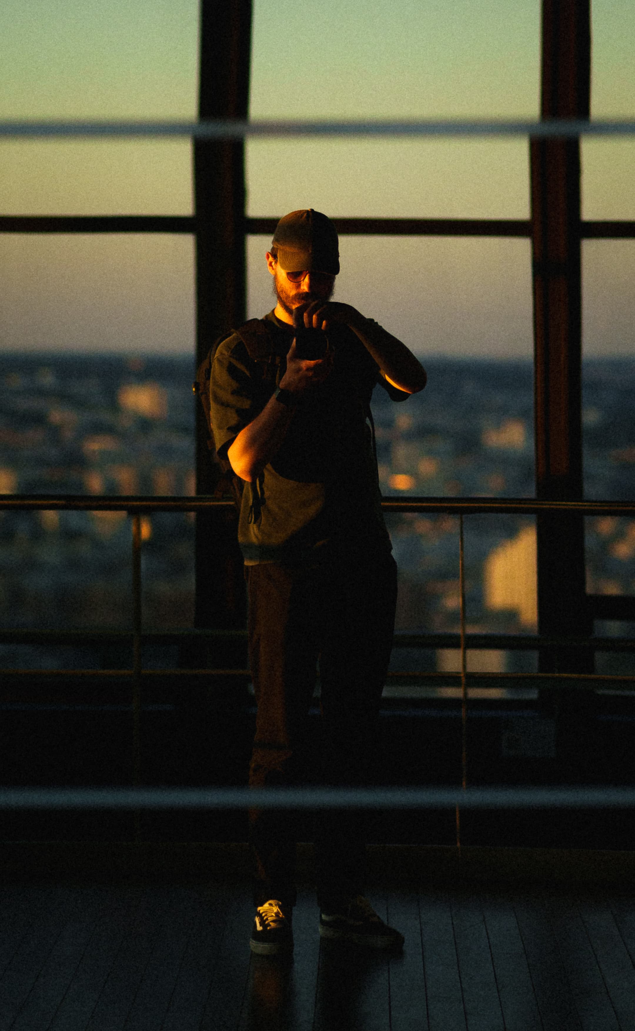 man silhouette paris viewpoint sunset